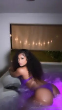 Melanincakes Having Some Hot Tub Fun In A Purple Bikini