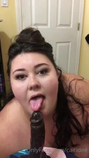 Caitidee Blows A Black Dildo