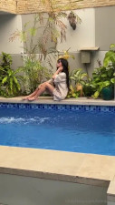 Mina Ash Plays With Her Dildo By The Pool