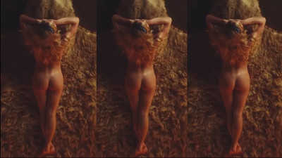 Sydney Sweeney Lays Naked On A Rug
