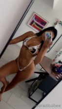 Brazibabee Teases In Her White Bikini