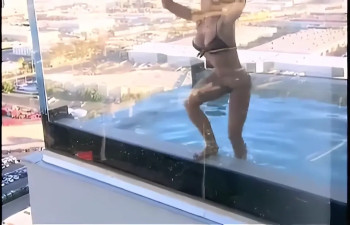 Kendra Wilkinson Dips In The Swimming Pool