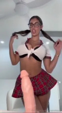 Horny Schoolgirl Mia Bailey Slurps On A Dildo