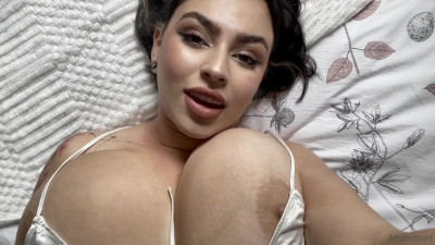 Amaretto Rubs Her Pussy While Lying On Bed